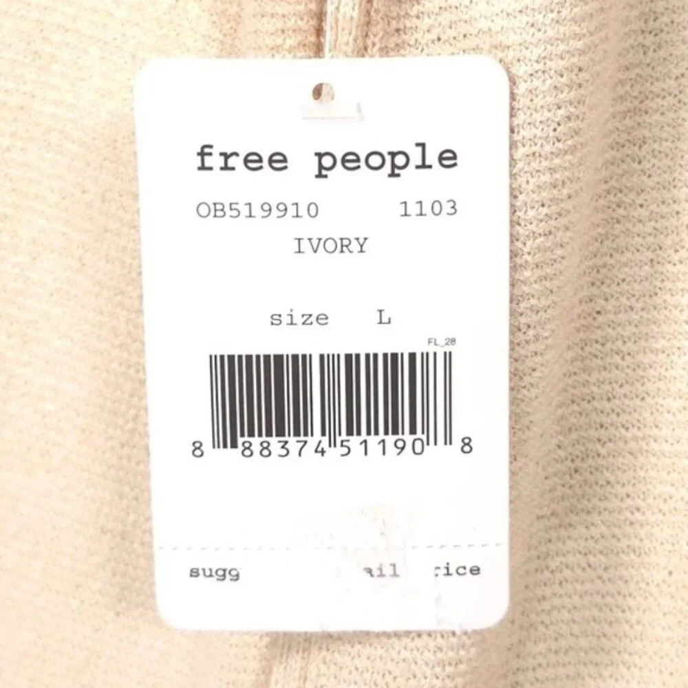 NWT Free People Size LARGE Criss Cross Tunic Sweater V Neck Side Slits Ivory‎